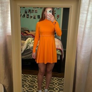 Size small orange Nike Olivia Kim long sleeve tennis dress